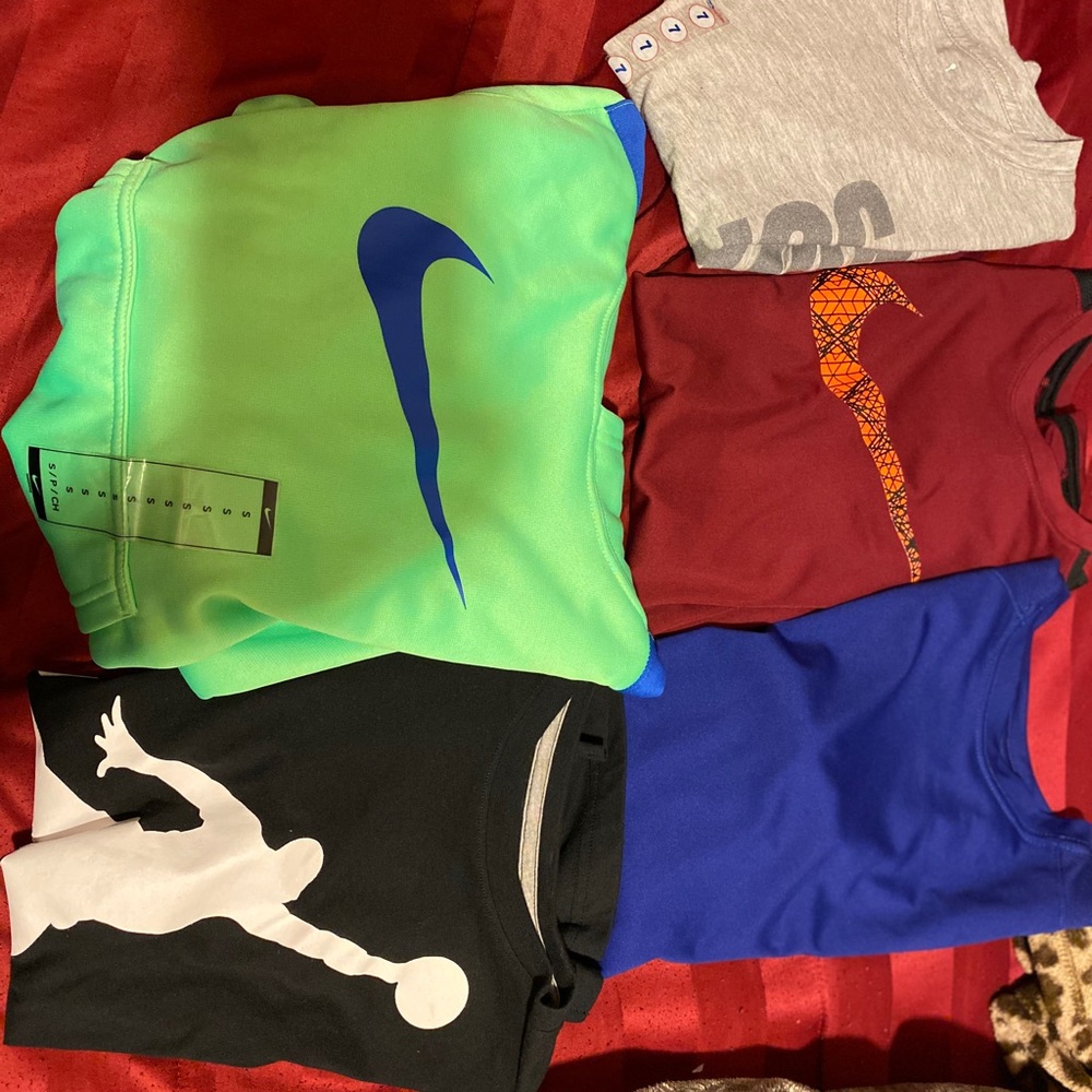 Boys Jordan and nike Shirts and a Nike sweater